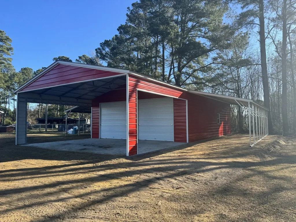 Red steel garage with attached carport