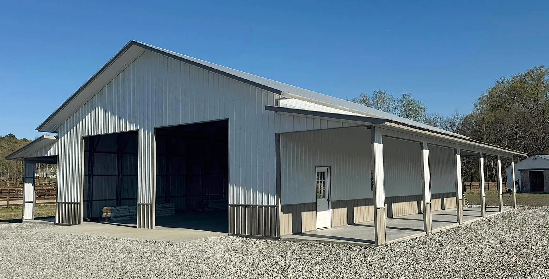 Steel garage with a lean-to