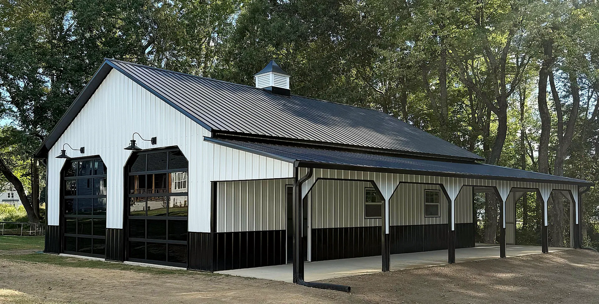 Metal-roofed building with a cupola